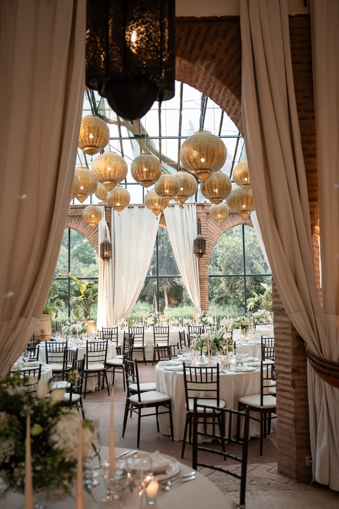 Palace wedding reception with golden Moroccan lanterns, Marrakech